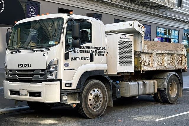 2023 Isuzu FTR dump truck in white