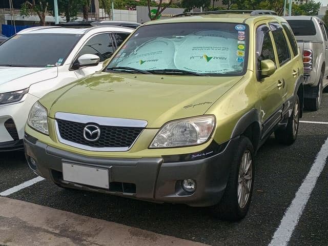 2007 Mazda Tribute 2.3L 2WD in Sublime 2-Tone