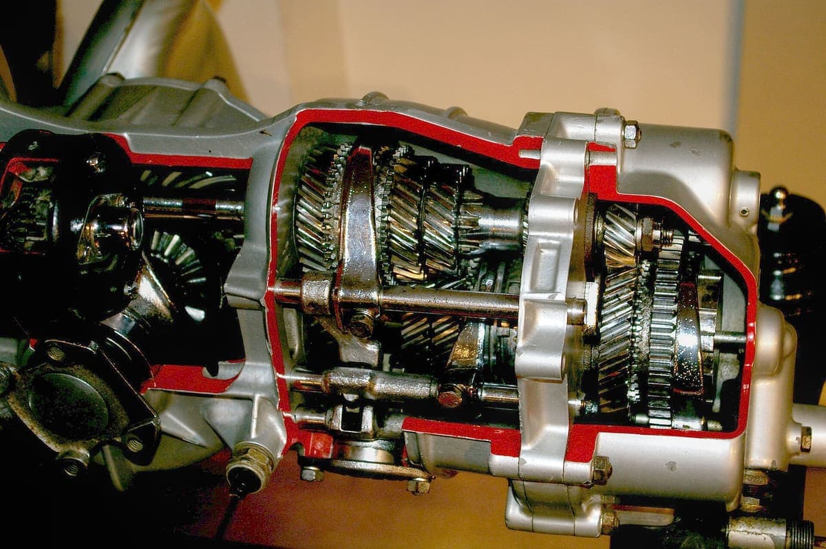 Cutaway of a Porsche gearbox with the casing opened to show the gear sets, shafts and bearings normally hidden inside a sealed housing
